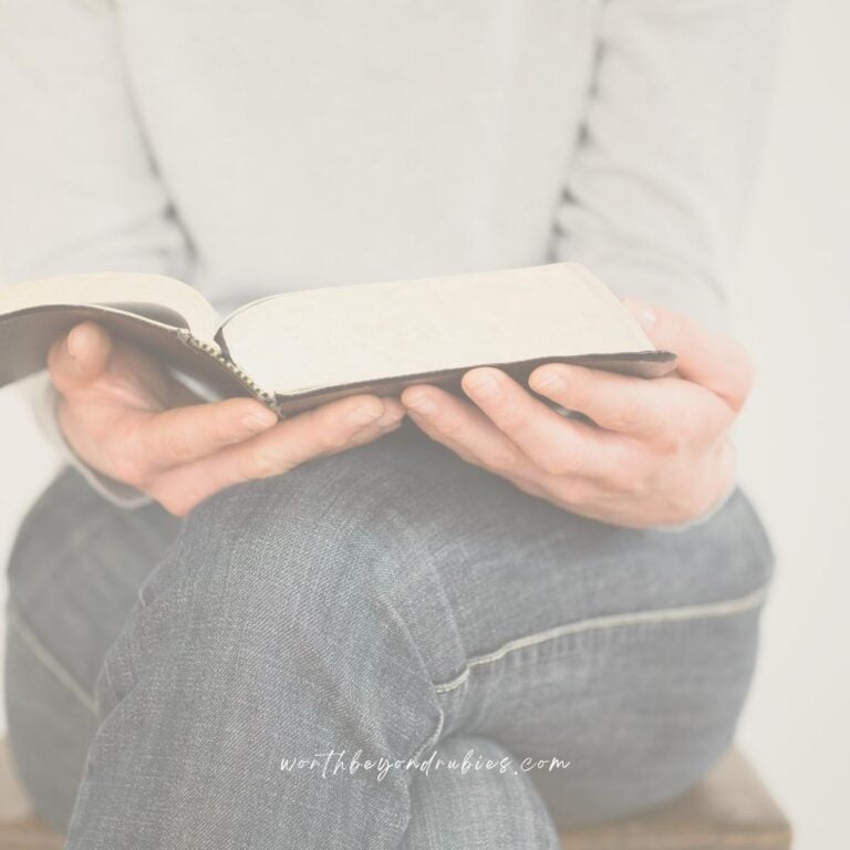 a woman holding a Bible open on her lap