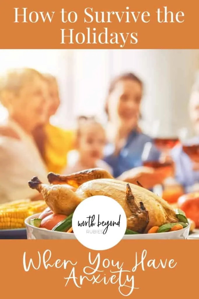 an image of a family gathered around the table at Thanksgiving dinner and a text overlay that says Surviving the Holidays When You Have Anxiety