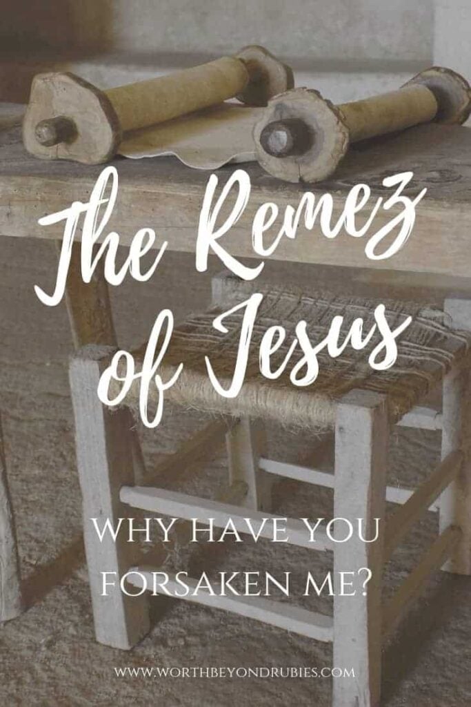 Ancient scrolls sitting on a wooden table with text overlay saying "The Remez of Jesus - Why Have You Forsaken Me?"