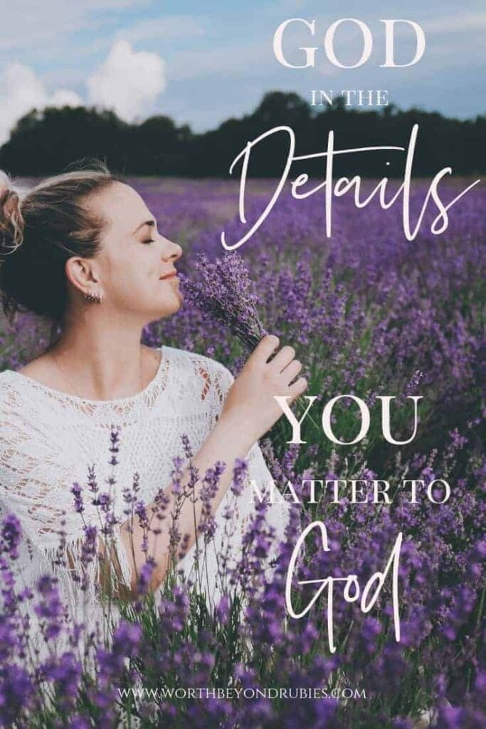 God in the Details - You Matter to God - A woman with her hair up in a messy bun in a field of lavender and she is holding some and smiling as she smells it