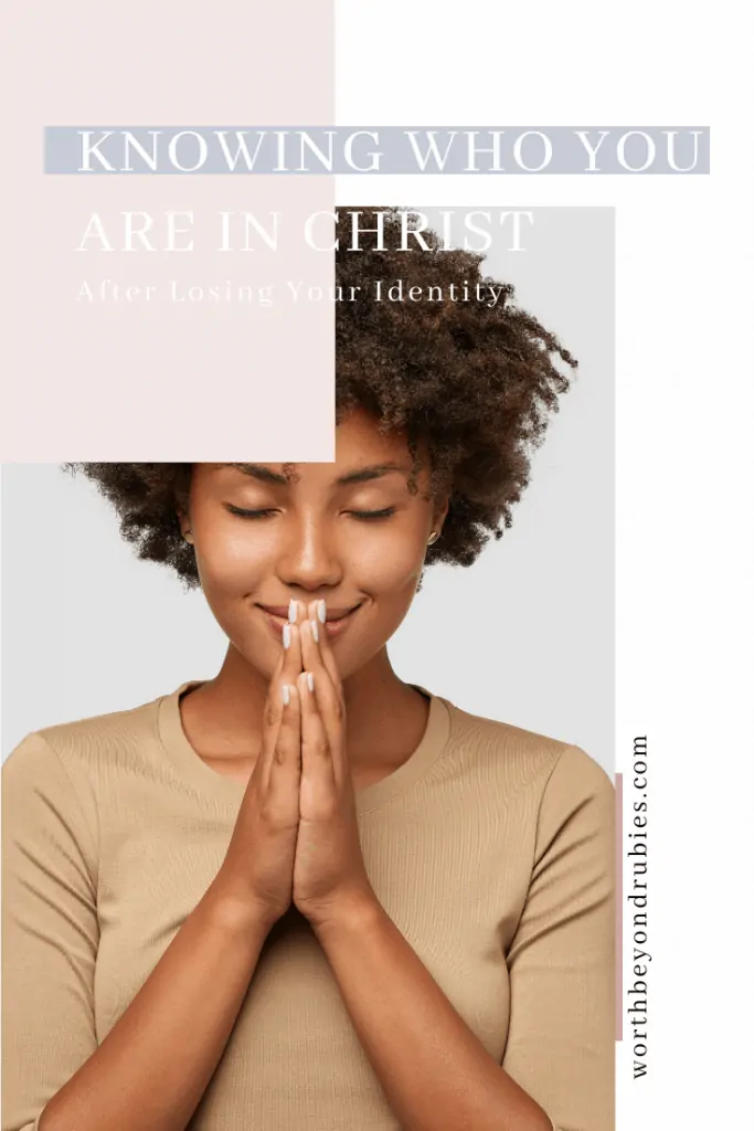 Knowing Who You Are in Christ - A beautiful black woman smiling as she holds her hands in prayer in front of her face