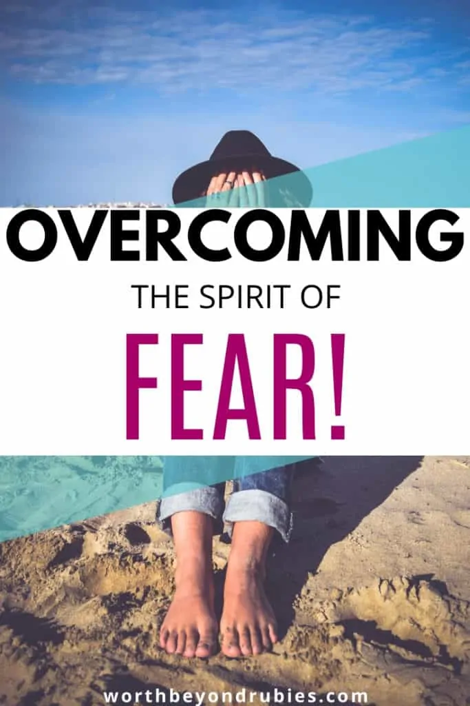 A woman sitting on the beach with a hat on and her hands covering her face - Overcoming the Spirit of Fear