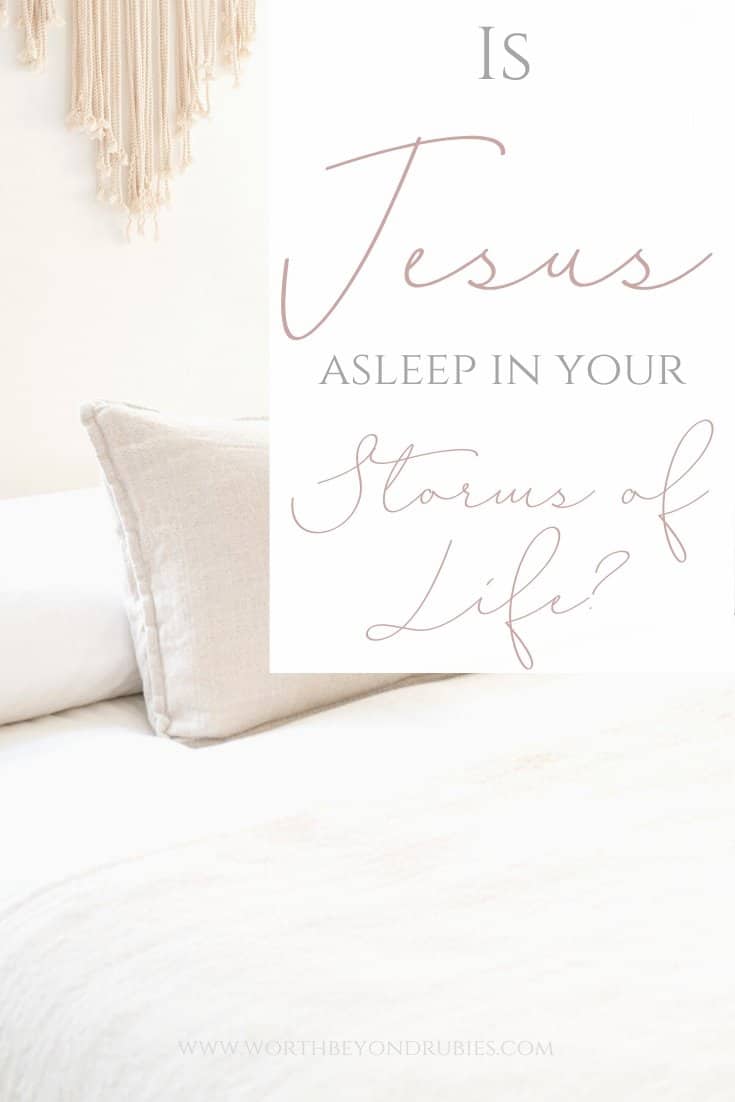 An image of a white bed with beige throw pillows on it and a text overlay that says Is Jesus Asleep in Your Storms of Life?