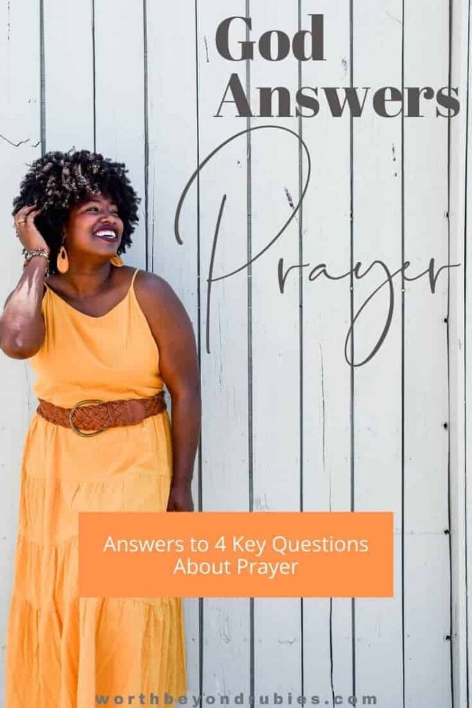 A woman in an orange dress against a whitewashed wooden wall and a text overlay that says "God Answers Prayer'