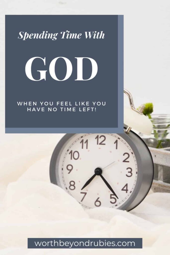 An image of a white and gray alarm clock on white fabric with succulents in the background with text that says Spending Time With God When You Are Struggling to Find the Time