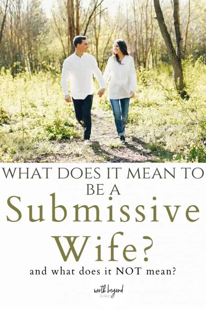 A woman and man walking hand in hand on a trail and text that says What Does it Mean to be a Submissive Wife - and what does it not mean?