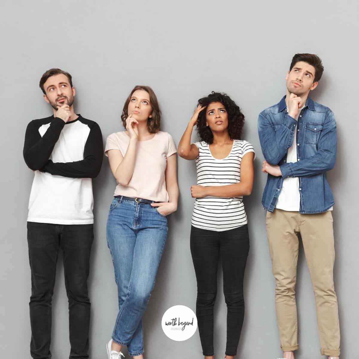 2 men and 2 women looking up thinking and the Worth Beyond Rubies logo at the bottom of image - for post on What is a Messianic Jew