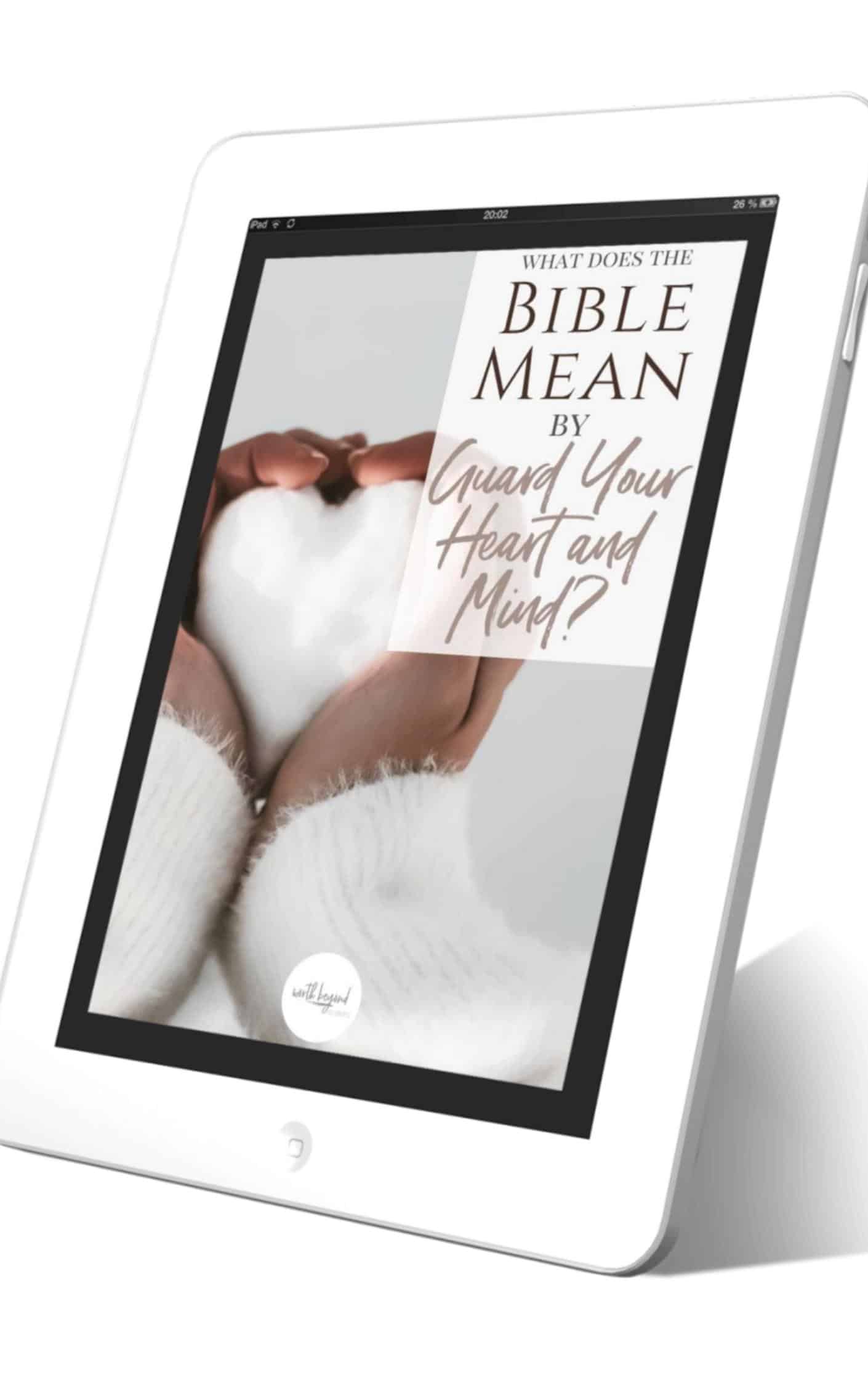 A tablet with an ebook cover on it and text that says What Does the Bible Mean by Guard Your Heart and Mind?