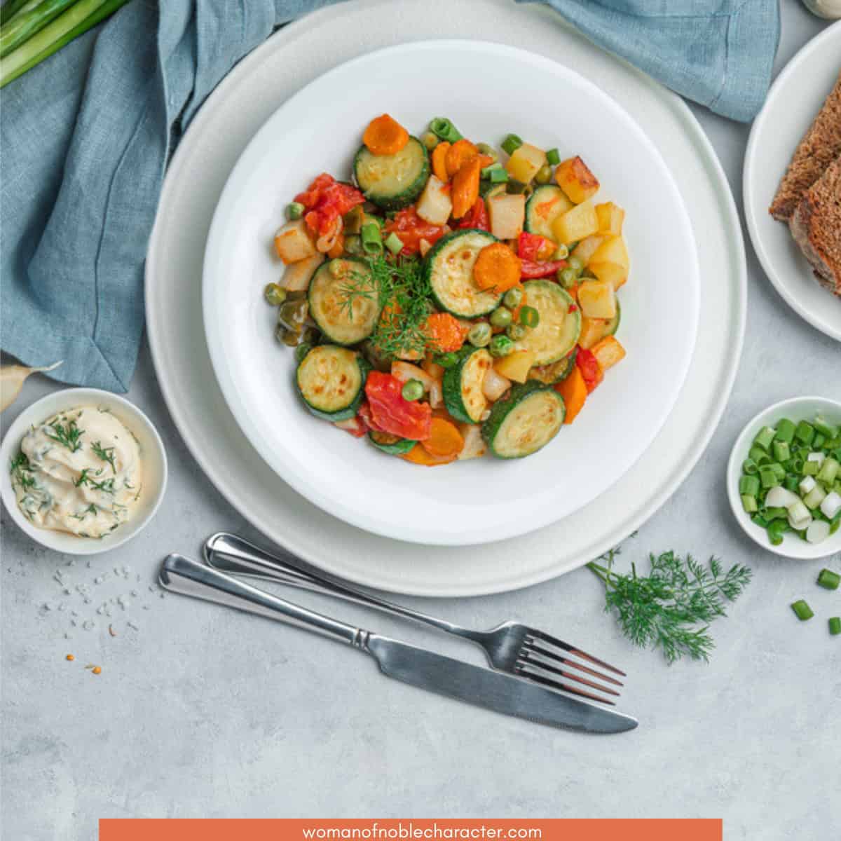 image of vegetables on white plate for the post What-is-a-Daniel-Fast-Its-Amazing-Benefits-and-How-to-Do-It-with-resources-and-recipes