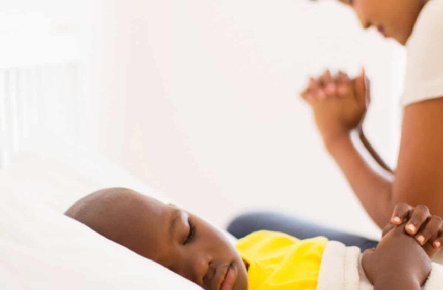 mother praying over sick son for the post prayers for a friend with cancer