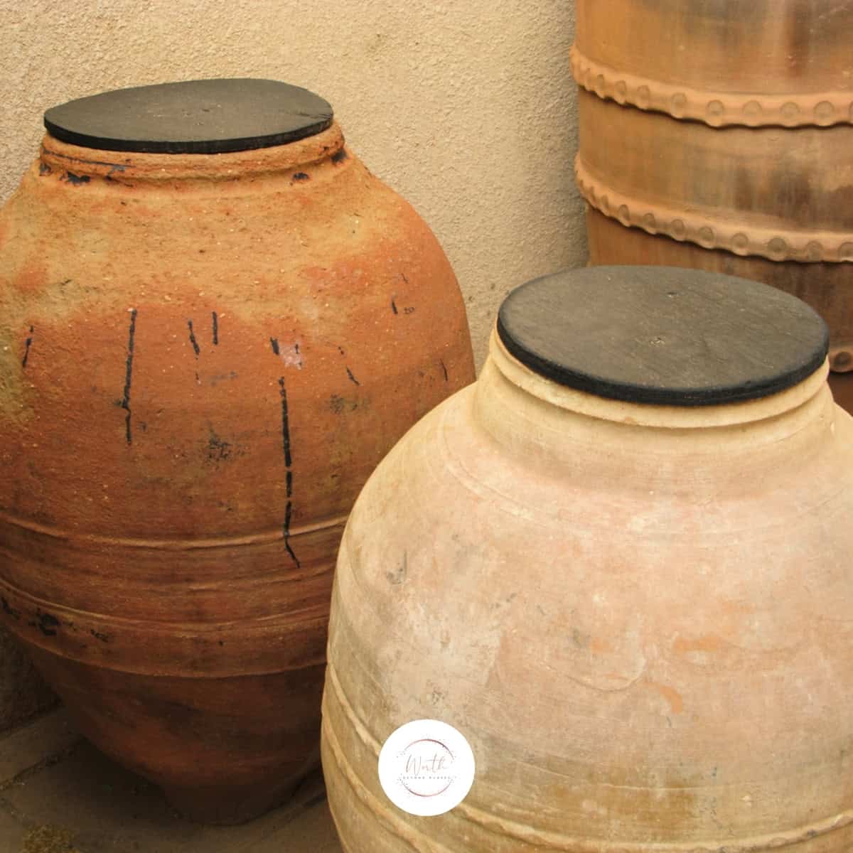 a group of large pots