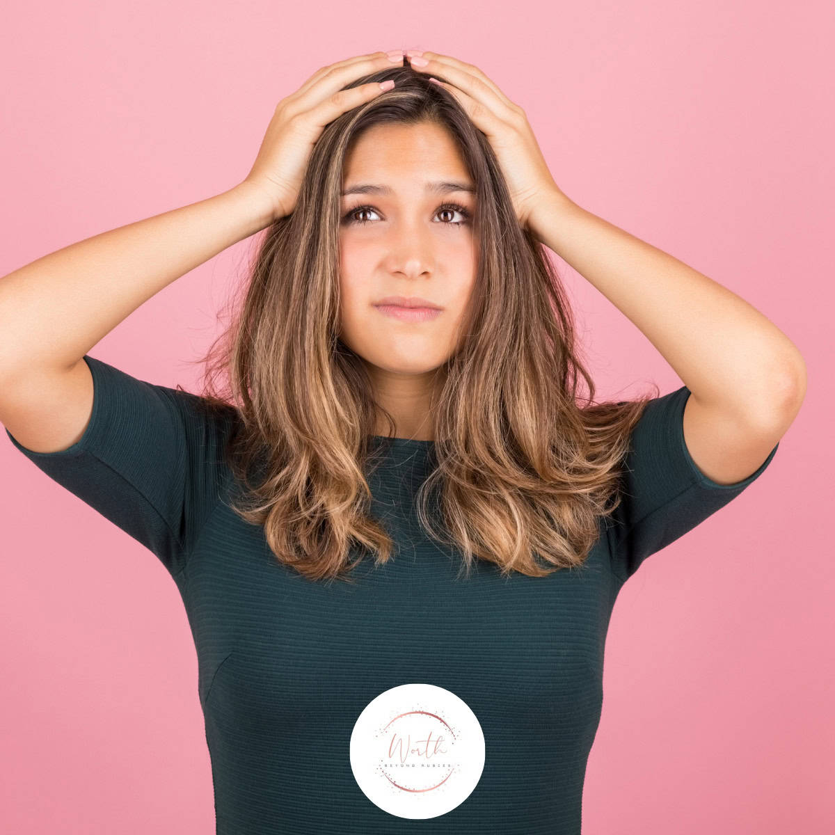 a woman holding her head